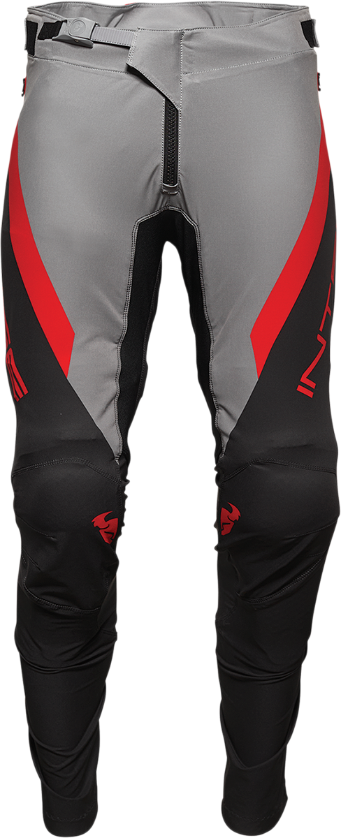 THOR Intense Assist MTB pants in black and gray, US size 32, with reinforced panels and adjustable waistband for cycling comfort.
