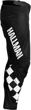 Black and white THOR Hallman Differ Cheq ATV pants in US size 36, offroad motocross apparel with durable fabric and protective features.