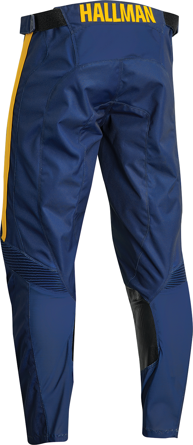 THOR Hallman Legend offroad ATV pants in navy color, US size 32, with reinforced knee panels and adjustable waist.