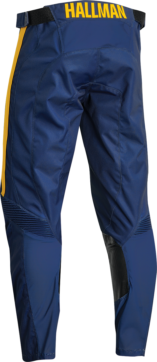 THOR Hallman Legend offroad ATV pants in navy color, US size 32, with reinforced knee panels and adjustable waist.