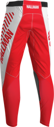 THOR Hallman Differ Slice offroad ATV pants in white and red with US size 28, featuring durable fabric and sporty design
