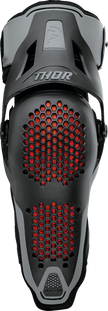 Black THOR Sentinel knee guards in S/M size, protective sports gear with padded support and adjustable straps for knee protection.