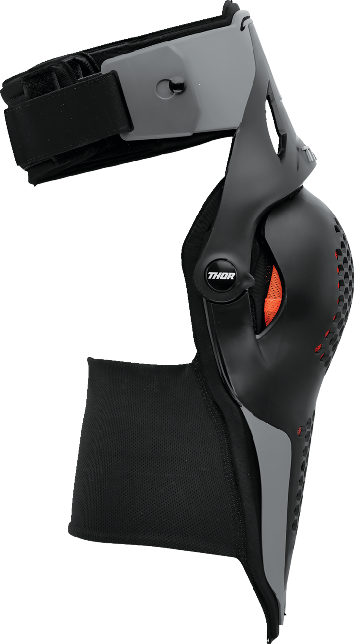 Black THOR Sentinel Knee Guards in size S/M, protective sports gear with durable padding for knee safety during activities.