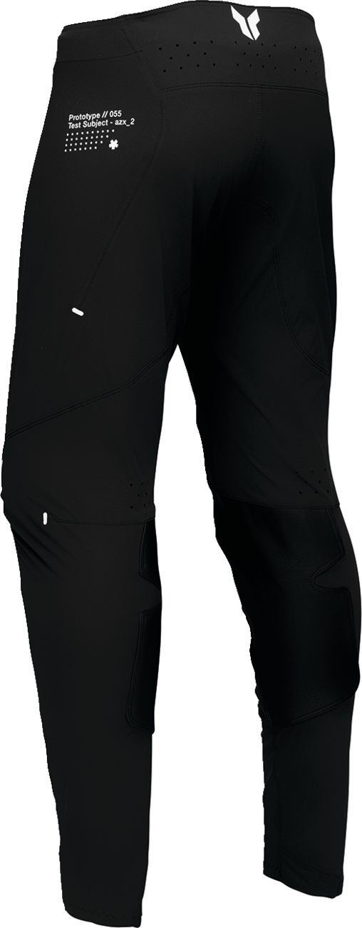 Black and white THOR Sportmode Strike offroad ATV pants in US size 30, featuring durable fabric and sporty design.