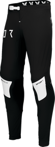 Black and white THOR Sportmode Strike offroad ATV pants in US size 30, made with durable offroad ATV apparel material.