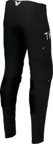 Black and white THOR Sportmode Strike ATV pants with US size 30, designed for off-road motocross riding.