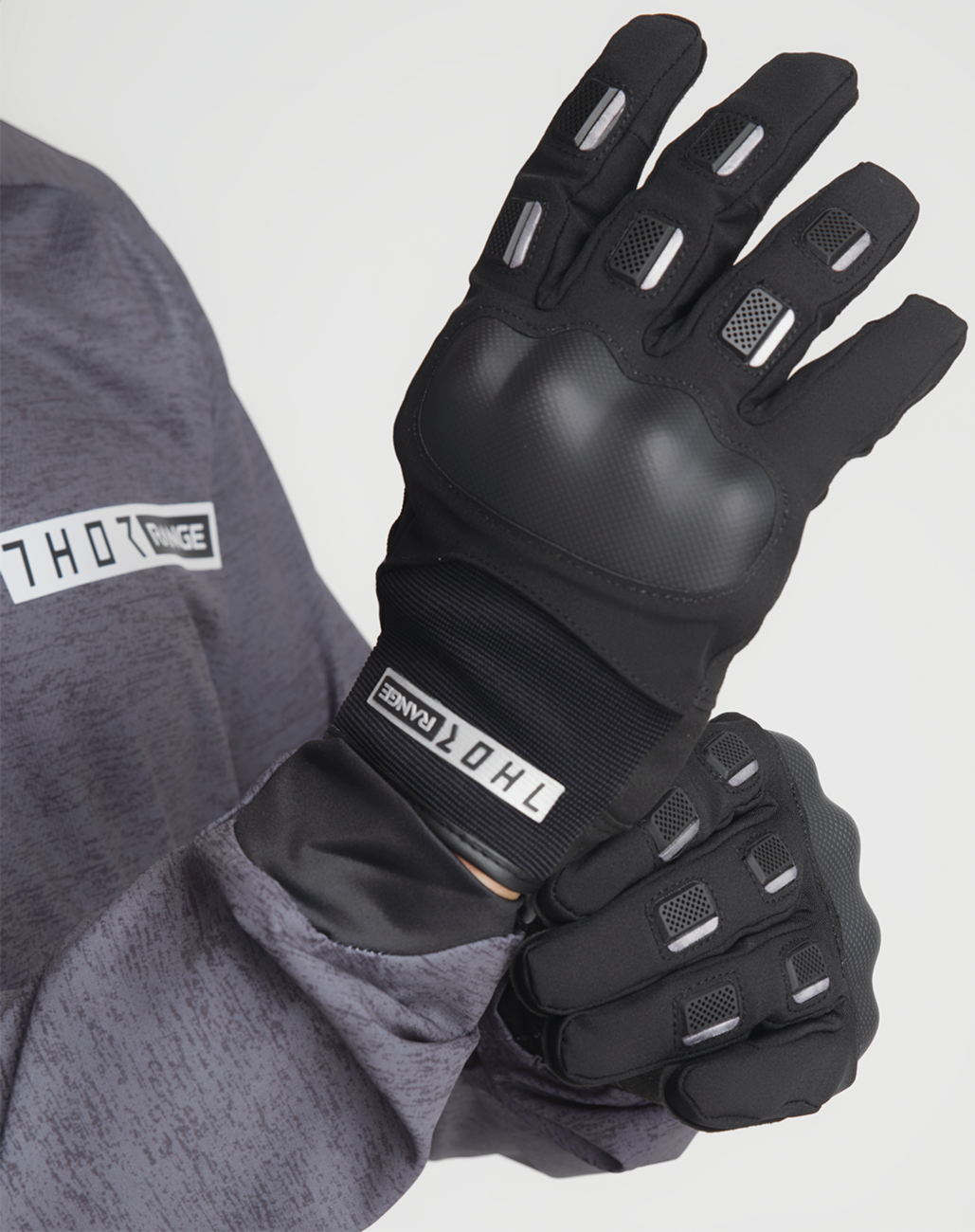 Black THOR Range Gloves in small size, showing the durable leather and adjustable wrist strap for motorcycle riding.
