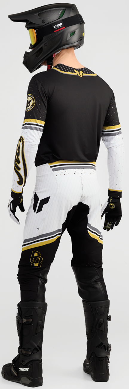 Black and gold THOR Sportmode Baller Pants for offroad ATV riding, US 32, made with durable offroad ATV apparel material.