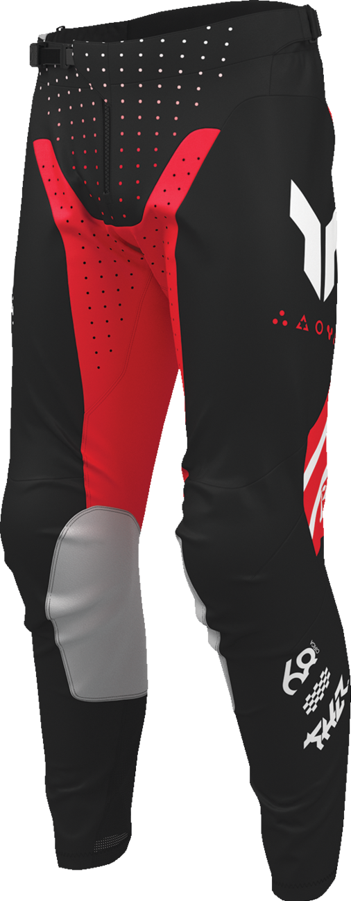 Black and red THOR Launchmode Futura ATV pants with reinforced knee panels and adjustable waist for off-road riding.