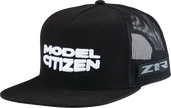 Black Z1R Model Citizen hat with adjustable strap, featuring a curved brim and embroidered logo, worn by a person.