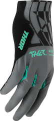 THOR Sportmode Mind Control gloves in charcoal and black, XS size, showing the padded, flexible motocross glove design.