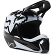 FOX Racing V1 Shield helmet with adjustable visor and ventilation, shown in a sleek black design for motocross riding.